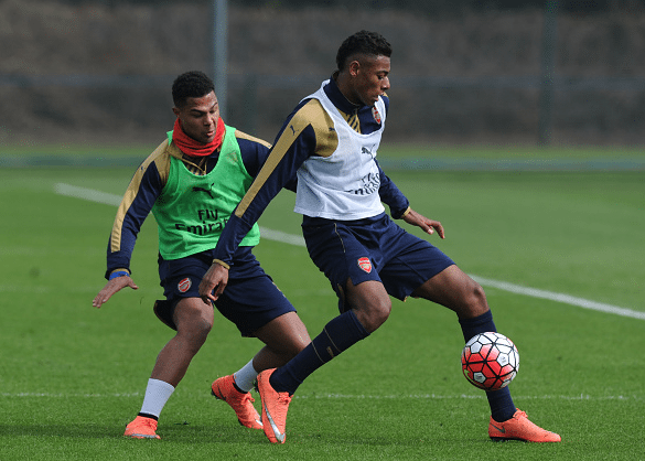 Serge Gnabry and Jeff Reine-Adelaide of Arsenal during a training session at London Colney on March 12, 2016 in St Albans, England.
