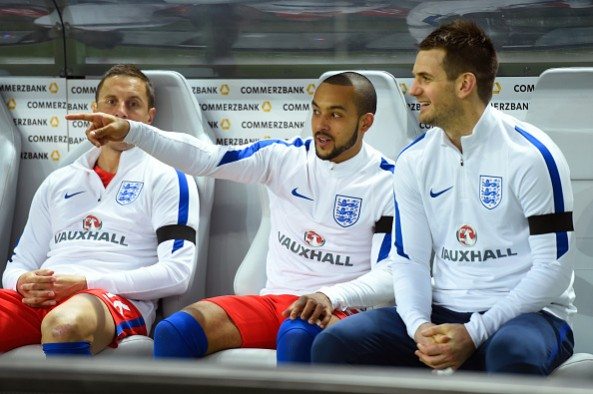 BERLIN, GERMANY - MARCH 26: (L to R) Phil Jagielka, Theo Walcott and Tom Heaton of England are seen on the bench during the International Friendly match between Germany and England at Olympiastadion on March 26, 2016 in Berlin, Germany. (Photo by Mike Hewitt/Getty Images)