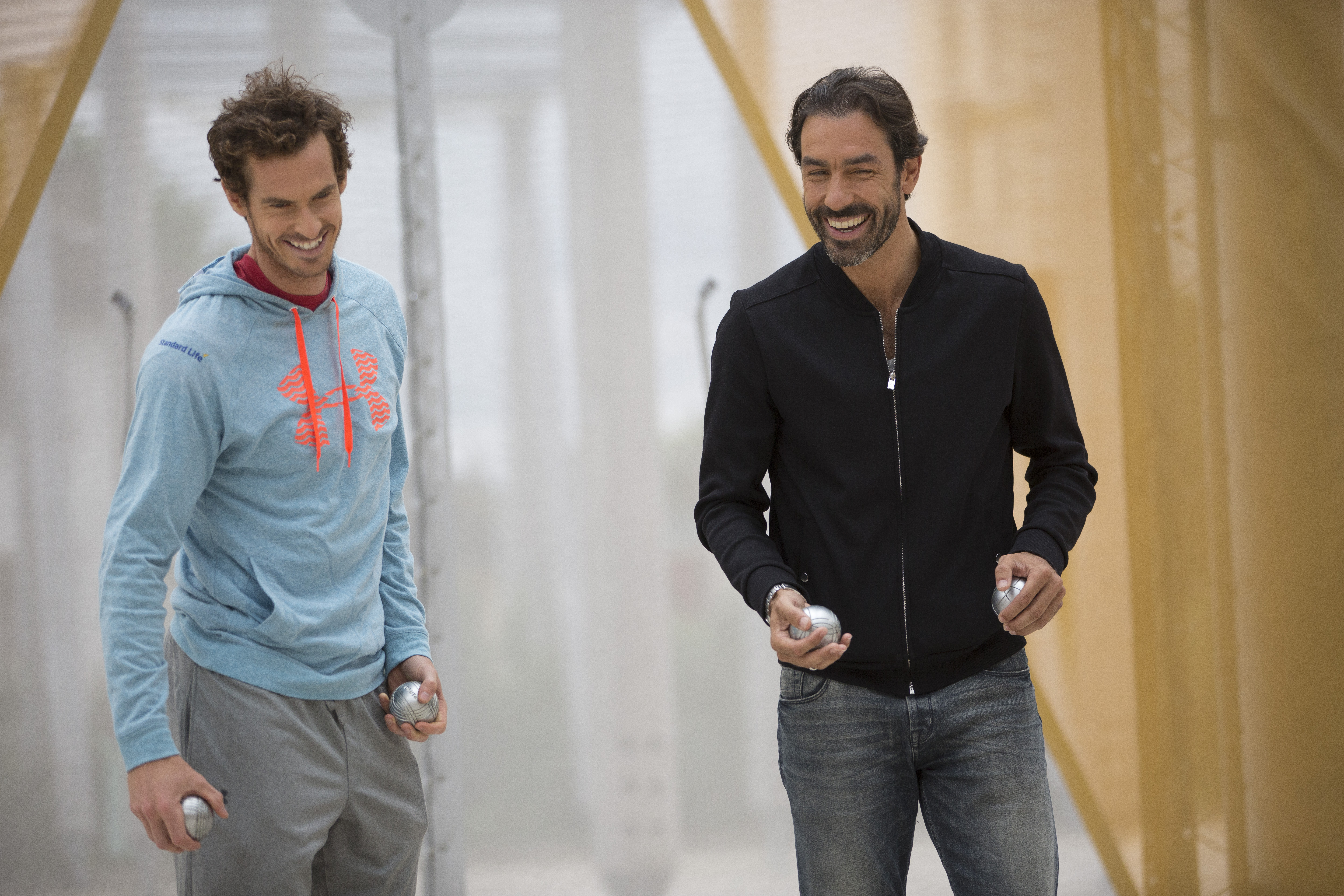 Tennis player Andy Murray and former France and Arsenal footballer Robert Pires play petanque at the Stade Alain Mimoun, Paris on 18th May 2016