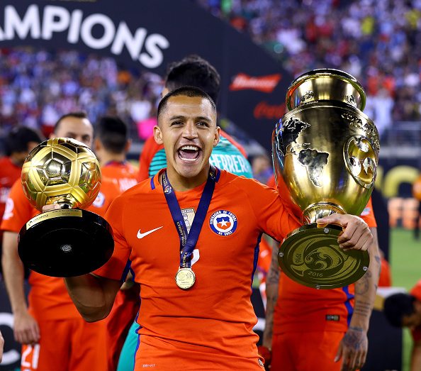 EAST RUTHERFORD, NJ - JUNE 26: Alexis Sanchez #7 of Chile celebrates the win over Argentina during the Copa America Centenario Championship match at MetLife Stadium on June 26, 2016 in East Rutherford, New Jersey.Chile defeated Argentina 0-0 with the 4-2 win in the shootout. (Photo by Elsa/Getty Images)