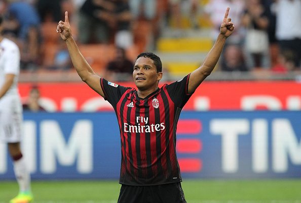 MILAN, ITALY - AUGUST 21: Carlos Bacca of AC Milan celebrates his second goal during the Serie A match between AC Milan and FC Torino at Stadio Giuseppe Meazza on August 21, 2016 in Milan, Italy.