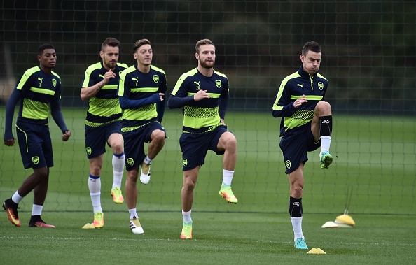 The on-pitch chemistry between Koscielny (right) and Mustafi (second right) has continued to strengthen since the latter's arrival from Valencia in the summer window. (Photo source: Glyn Kirk / Getty Images) 