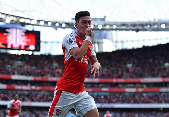 LONDON, ENGLAND - OCTOBER 15: Mesut Ozil of Arsenal celebrates scoring his sides third goal during the Premier League match between Arsenal and Swansea City at Emirates Stadium on October 15, 2016 in London, England. (Photo by Mike Hewitt/Getty Images)