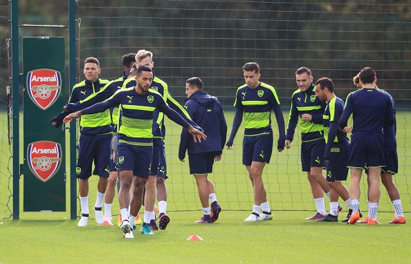 ST ALBANS, ENGLAND - OCTOBER 18: Theo Walcott of Arsenal warms up with team mates during an Arsenal training session on the eve of their UEFA Champions League Group A match against Ludogorets Razgrad at London Colney on October 18, 2016 in St Albans, England. (Photo by Matthew Lewis/Getty Images)