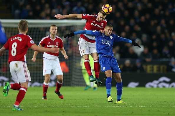 LEICESTER, ENGLAND - NOVEMBER 26: Calum Chambers of Middlesbrough (CR) and Islam Slimani of Leicester City (R) battle to win a header during the Premier League match between Leicester City and Middlesbrough at The King Power Stadium on November 26, 2016 in Leicester, England. (Photo by Alex Morton/Getty Images)
