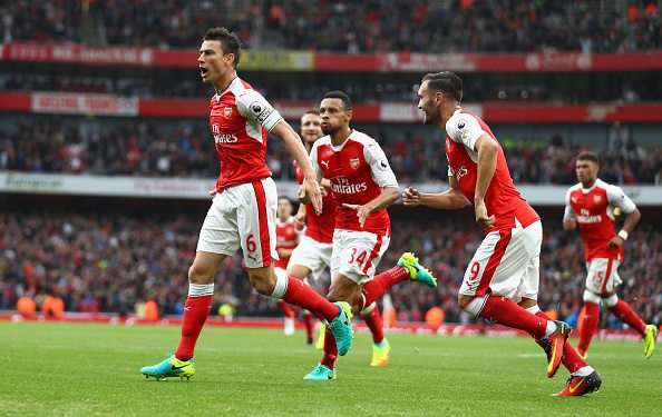LONDON, ENGLAND - SEPTEMBER 10: Laurent Koscielny of Arsenal celebrates scoring his sides first goal with his Arsenal team mates during the Premier League match between Arsenal and Southampton at Emirates Stadium on September 10, 2016 in London, England. (Photo by Paul Gilham/Getty Images)