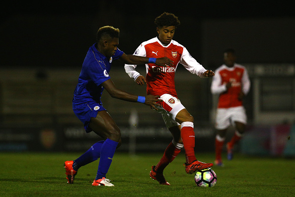 BOREHAMWOOD, ENGLAND - NOVEMBER 29: Darnell Johnson of Leicester City and Gedion Zelalem of Arsenal in action during the Premier League 2 match between Arsenal and Leicester City at Meadow Park on November 28, 2016 in Borehamwood, England. (Photo by Alex Pantling/Getty Images)