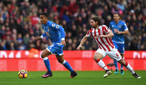 STOKE ON TRENT, ENGLAND - NOVEMBER 19: Junior Stanislas of AFC Bournemouth (L) is chased down by Joe Allen of Stoke City (R) during the Premier League match between Stoke City and AFC Bournemouth at Bet365 Stadium on November 19, 2016 in Stoke on Trent, England. (Photo by Gareth Copley/Getty Images)