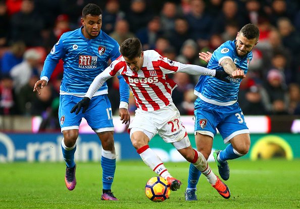 STOKE ON TRENT, ENGLAND - NOVEMBER 19: As well as he is on the ball, Wilshere (far right) has improved his level of tenacity out of possession to win the ball back quickly. (Photo source: Dave Thompson / Getty Images) 