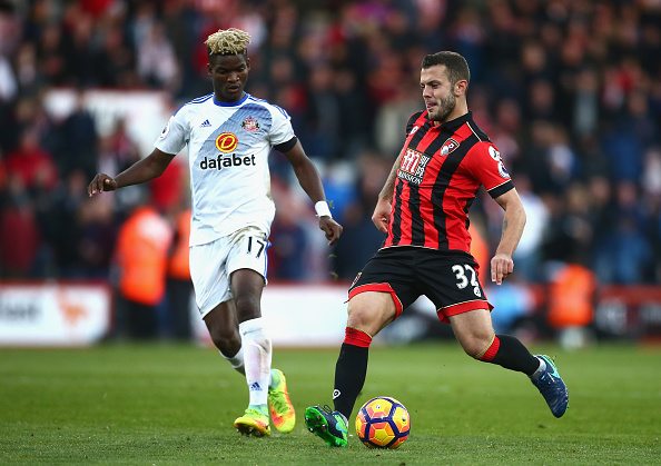 BOURNEMOUTH, ENGLAND - NOVEMBER 05: Jack Wilshere of AFC Bournemouth (R) passes the ball past Dider Ndong of Sunderland (L) during the Premier League match between AFC Bournemouth and Sunderland at Vitality Stadium on November 5, 2016 in Bournemouth, England. (Photo by Jordan Mansfield/Getty Images)