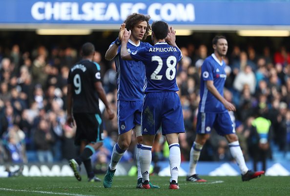LONDON, ENGLAND - DECEMBER 11: Cesar Azpilicueta and David Luiz of Chelsea celebrate their team's 1-0 win after the Premier League match between Chelsea and West Bromwich Albion at Stamford Bridge on December 11, 2016 in London, England. (Photo by Julian Finney/Getty Images)
