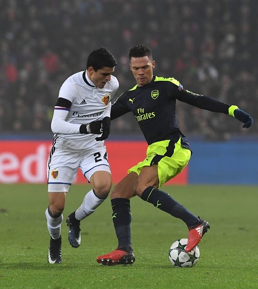 Arsenal's English defender Kieran Gibbs (R) vies with Basel's Norwegian forward Mohamed Elyounoussi during the UEFA Champions league Group A football match between FC Basel 1893 and Arsenal FC on December 6, 2016 at the St Jakob Park stadium in Basel. / AFP / Patrick HERTZOG (Photo credit should read PATRICK HERTZOG/AFP/Getty Images)