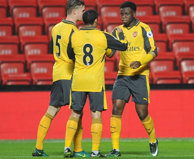 LIVERPOOL, ENGLAND - DECEMBER 12: Stephy Mavididi (R) celebrates scoring his and Arsenal's first goal against Liverpool at Anfield. (Photo by David Price / Arsenal FC via Getty Images)