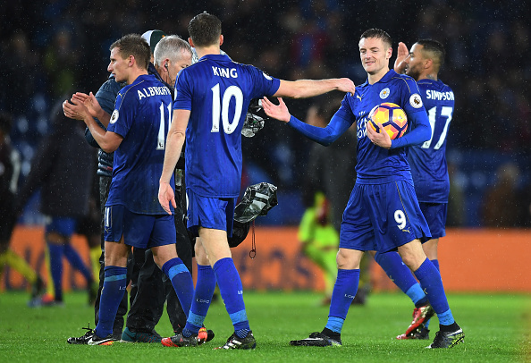 LEICESTER, ENGLAND - DECEMBER 10: Andy King of Leicester City (L) and Jamie Vardy of Leicester City (R) embrace after the final whistle during the Premier League match between Leicester City and Manchester City at the King Power Stadium on December 10, 2016 in Leicester, England. (Photo by Michael Regan/Getty Images)
