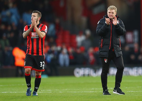 BOURNEMOUTH, ENGLAND - DECEMBER 04: Eddie Howe manager of AFC Bournemouth celebrates victory with Jack Wilshere of AFC Bournemouth after the Premier League match between AFC Bournemouth and Liverpool at Vitality Stadium on December 4, 2016 in Bournemouth, England.