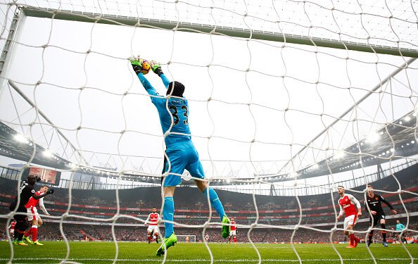 Cech (pictured, no. 33) makes a save during Arsenal's 2-0 win over Hull