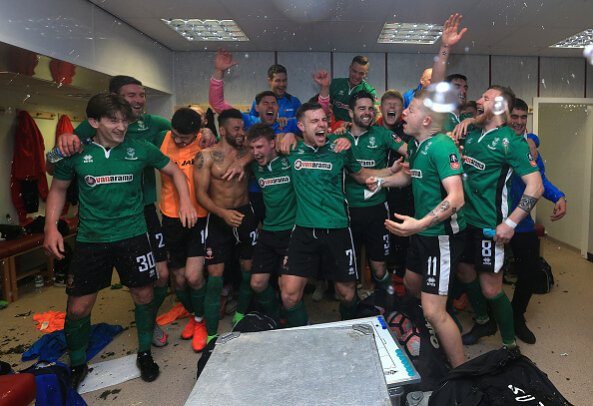 Lincoln City celebrate beating Burnley