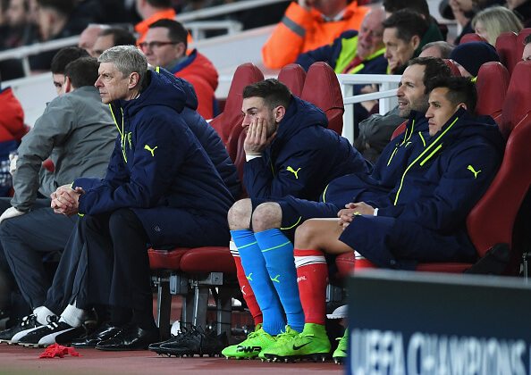 Wenger and some of his first-team players during the 5-1 defeat against Bayern in midweek