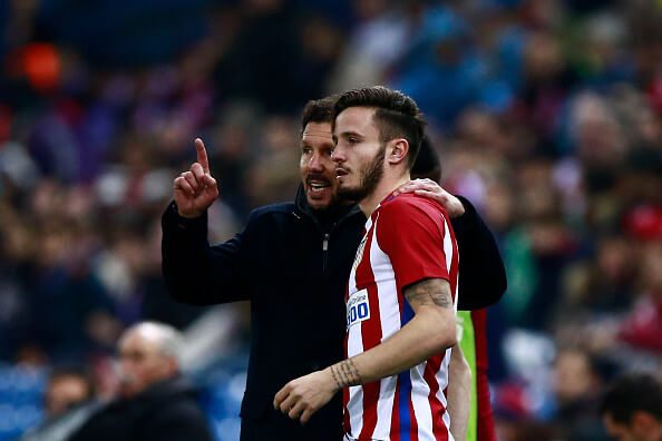 Saúl receiving instructions from Simeone during Atletico's game against Espanyol in December last year