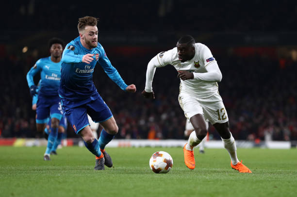 LONDON, ENGLAND - FEBRUARY 22: Calum Chambers of Arsenal and Ken Sema of Ostersunds FK during UEFA Europa League Round of 32 match between Arsenal and Ostersunds FK at the Emirates Stadium on February 22, 2018 in London, United Kingdom. (Photo by Catherine Ivill/Getty Images)
