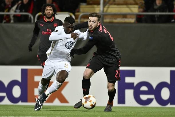 Ostersund's Salisu Abdullahi Gero (L) and Arsenal's Calum Chambers vie for the ball during the UEFA Europa League round of 32, first leg football match of Ostersund FK vs Arsenal FC on February 15, 2018 in Ostersund, Sweden. / AFP PHOTO / TT NEWS AGENCY / Robert HENRIKSSON / Sweden OUT
