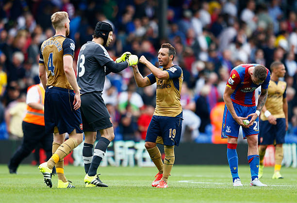 LONDON, ENGLAND - AUGUST 16: Santi Cazorla of Arsenal celebrates victory with Petr Cech of Arsenal after the Barclays Premier League match between Crystal Palace and Arsenal at Selhurst Park on August 16, 2015 in London, England. (Photo by Julian Finney/Getty Images)