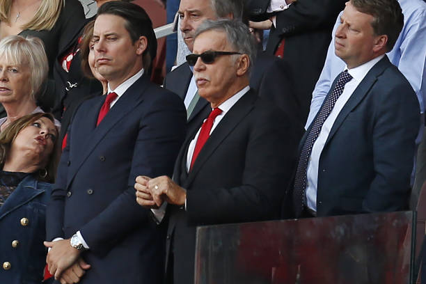 Arsenal's US owner Stan Kroenke (C) looks on during the presentation to Arsenal's French manager Arsene Wenger after the English Premier League football match between Arsenal and Burnley at the Emirates Stadium in London on May 6, 2018. (Photo by Ian KINGTON / IKIMAGES / AFP) 