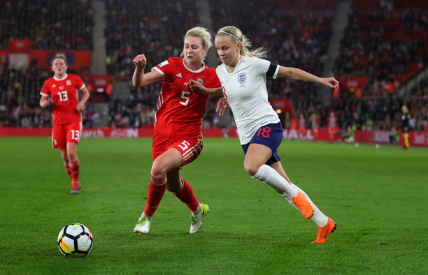 SOUTHAMPTON, ENGLAND - APRIL 06: Rhiannon Roberts of Wales battles with Beth Mead during the Women's World Cup Qualifier between England and Wales at St Mary's Stadium on April 6, 2018 in Southampton, England. (Photo by Catherine Ivill/Getty Images)