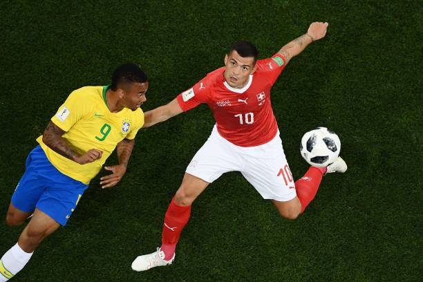 Brazil's forward Gabriel Jesus (L) vies with Switzerland's midfielder Granit Xhaka during the Russia 2018 World Cup Group E football match between Brazil and Switzerland at the Rostov Arena in Rostov-On-Don on June 17, 2018. (Photo by Jewel SAMAD / AFP)