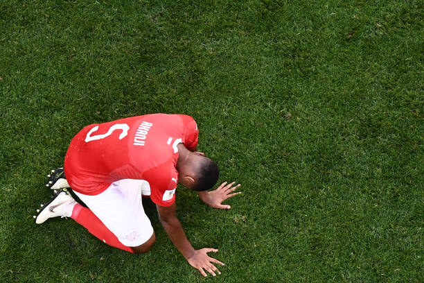 OPSHOT - Switzerland's defender Manuel Akanji looks dejected at the end of the Russia 2018 World Cup round of 16 football match between Sweden and Switzerland at the Saint Petersburg Stadium in Saint Petersburg on July 3, 2018. Sweden won 1-0. (Photo by Jewel SAMAD / AFP)