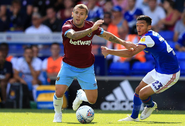 IPSWICH, ENGLAND - JULY 28: Jack Wilshere of West Ham United and Andre Dozzell of Ipswich Town compete for the ball during the pre-season friendly match between Ipswich Town and West Ham United at Portman Road on July 28, 2018 in Ipswich, England. (Photo by Stephen Pond/Getty Images)