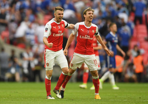 LONDON, ENGLAND - MAY 27: Aaron Ramsey and Nacho Monreal of Arsenal celebrate victory after the Emirates FA Cup Final between Arsenal and Chelsea at Wembley Stadium on May 27, 2017 in London, England. (Photo by Laurence Griffiths/Getty Images)