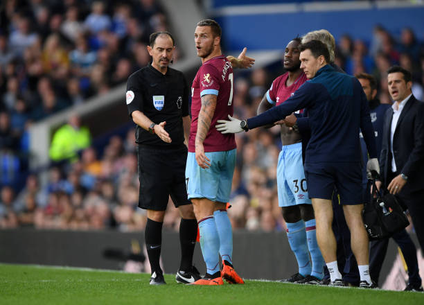 LIVERPOOL, ENGLAND - SEPTEMBER 16: Marko Arnautovic of West Ham United confronts fourth official David Coote during the Premier League match between Everton FC and West Ham United at Goodison Park on September 16, 2018 in Liverpool, United Kingdom. (Photo by Stu Forster/Getty Images)
