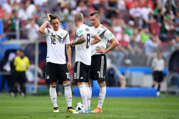 MOSCOW, RUSSIA - JUNE 17: Germany players show their dejection following Mexico's first goal during the 2018 FIFA World Cup Russia group F match between Germany and Mexico at Luzhniki Stadium on June 17, 2018 in Moscow, Russia. (Photo by Hector Vivas/Getty Images)
