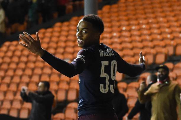 Arsenal's English midfielder Joe Willock celebrates scoring his and Arsenal's second goal during the English FA Cup third round football match between Blackpool and Arsenal at Bloomfield Road in Blackpool, north west England on January 5, 2019. (Photo by Paul ELLIS / AFP)