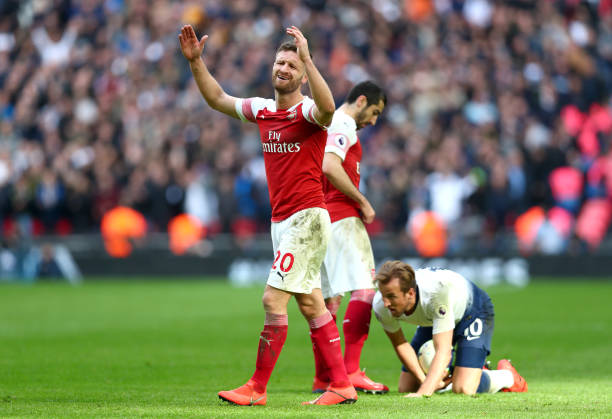 LONDON, ENGLAND - MARCH 02: Shkodran Mustafi of Arsenal reacts during the Premier League match between Tottenham Hotspur and Arsenal FC at Wembley Stadium on March 02, 2019 in London, United Kingdom. (Photo by Clive Rose/Getty Images)