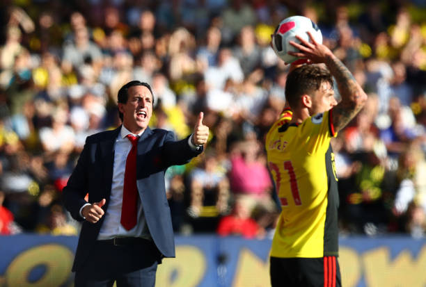 WATFORD, ENGLAND - SEPTEMBER 15: Unai Emery, Manager of Arsenal reacts as Kiko Femenia of Watford take a throw in during the Premier League match between Watford FC and Arsenal FC at Vicarage Road on September 15, 2019 in Watford, United Kingdom. (Photo by Julian Finney/Getty Images)