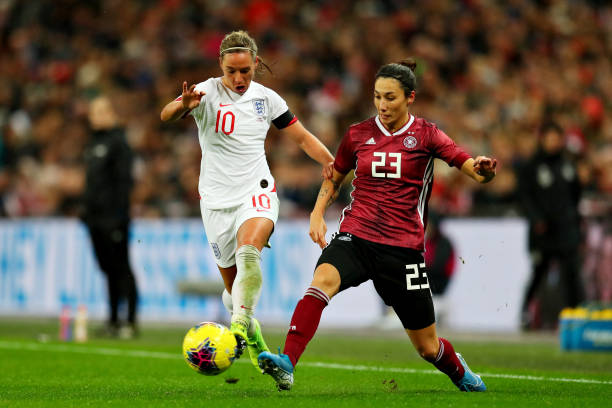 LONDON, ENGLAND - NOVEMBER 09: Jordan Nobbs of England and Sara Doorsoun of Germany battle for the ball during the International Friendly between England Women and Germany Women at Wembley Stadium on November 09, 2019 in London, England. (Photo by Catherine Ivill/Getty Images)