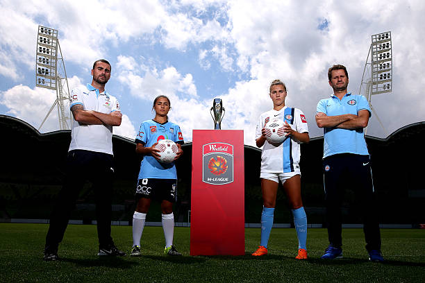MELBOURNE, AUSTRALIA - JANUARY 30: (L- R) Sydney FC head coach Dan Barrett and captain Teresa Polias and Melbourne City FC head coach Joe Montemurro and captain Steph Catley pose during a W-League Grand Final media opportunity at AAMI Park on January 30, 2016 in Melbourne, Australia. (Photo by Michael Dodge/Getty Images)