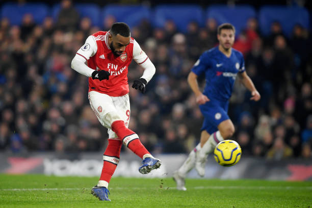 LONDON, ENGLAND - JANUARY 21: Alexandre Lacazette of Arsenal scores a goal which is later disallowed due to being offside during the Premier League match between Chelsea FC and Arsenal FC at Stamford Bridge on January 21, 2020 in London, United Kingdom. (Photo by Mike Hewitt/Getty Images)