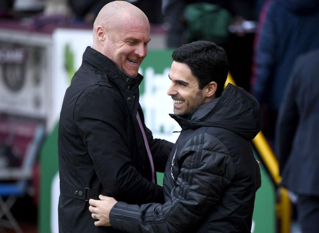 BURNLEY, ENGLAND - FEBRUARY 02: Sean Dyche, Manager of Burnley embraces Mikel Arteta, Manager of Arsenal prior to the Premier League match between Burnley FC and Arsenal FC at Turf Moor on February 02, 2020, in Burnley, United Kingdom. (Photo by Gareth Copley/Getty Images)