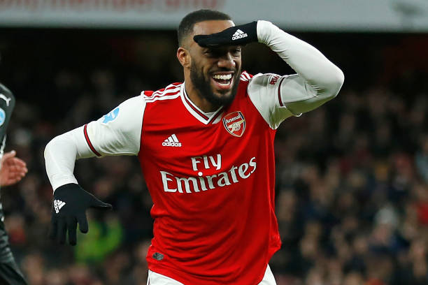 Arsenal's French striker Alexandre Lacazette celebrates after scoring their fourth goal during the English Premier League football match between Arsenal and Newcastle United at the Emirates Stadium in London on February 16, 2020. - Arsenal won the game 4-0.