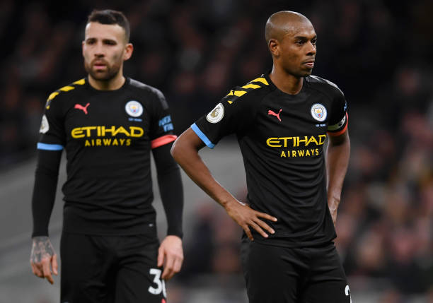 Fernandinho and Nicolas Otamendi of Manchester City show their disappointment during the Premier League match between Tottenham Hotspur and Manchester City at Tottenham Hotspur Stadium on February 02, 2020 in London, United Kingdom. 