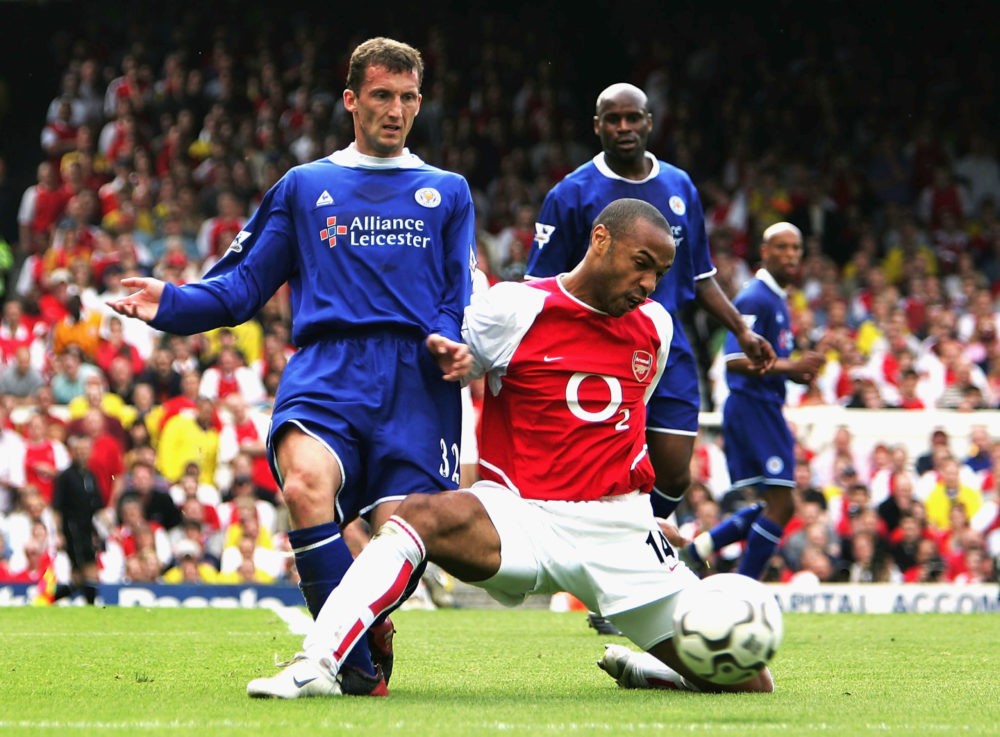Arsenal's InvinciblesLONDON - MAY 15: Thierry Henry of Arsenal battles with Billy McKinlay of Leicester City during the FA Barclaycard Premiership match between Arsenal and Leicester City at Highbury on May 15, 2004 in London. (Photo by Clive Mason/Getty Images)