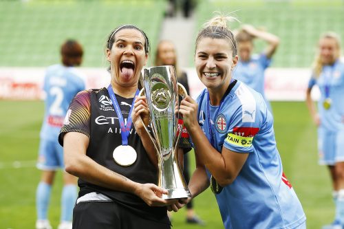 MELBOURNE, AUSTRALIA - MARCH 21: Melbourne City goalkeeper Lydia Williams (L) and Steph Catley of Melbourne City pose with the trophy after winning the 2020 W-League Grand Final match between Melbourne City and Sydney FC at AAMI Park on March 21, 2020 in Melbourne, Australia. (Photo by Daniel Pockett/Getty Images)