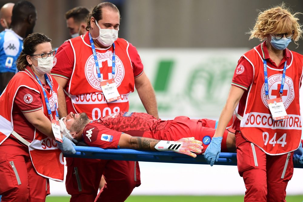 Napoli's Colombian goalkeeper David Ospina is stretched out of the pitch following a head injury during the Italian Serie A football match Atalanta vs Napoli played on July 2, 2020 behind closed doors at the Atleti Azzurri d'Italia stadium in Bergamo, as the country eases its lockdown aimed at curbing the spread of the COVID-19 infection, caused by the novel coronavirus. (Photo by Miguel MEDINA / AFP) (Photo by MIGUEL MEDINA/AFP via Getty Images)
