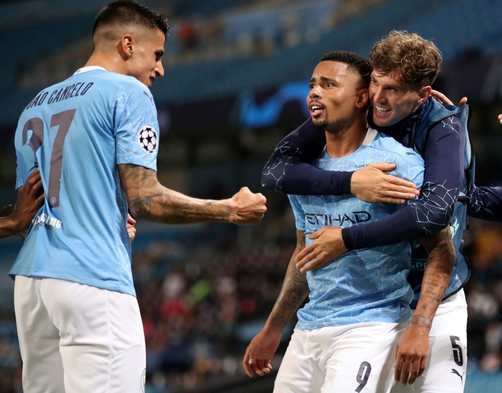 Manchester City's Brazilian striker Gabriel Jesus (C) celebrates scoring his team's second goal during the UEFA Champions League round of 16 second leg football match between Manchester City and Real Madrid at the Etihad Stadium in Manchester, north west England on August 7, 2020. (Photo by Nick Potts / POOL / AFP) (Photo by NICK POTTS/POOL/AFP via Getty Images)