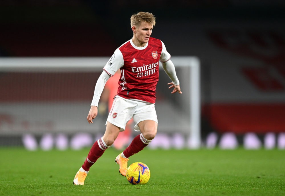 LONDON, ENGLAND: Martin Odegaard of Arsenal runs with the ball during the Premier League match between Arsenal and Manchester United at Emirates Stadium on January 30, 2021. (Photo by Shaun Botterill/Getty Images)
