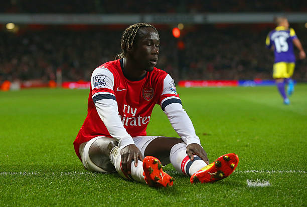 LONDON, ENGLAND - MARCH 25: Bacary Sagna of Arsenal reacts during the Barclays Premier League match between Arsenal and Swansea City at Emirates Stadium on March 25, 2014 in London, England. (Photo by Julian Finney/Getty Images)