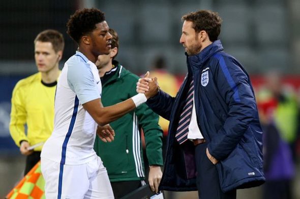 THUN, SWITZERLAND - MARCH 26: Gareth Southgate manager of England U21(R) shakes hands with Chuba Akpom as he leaves the pitch during the European Under 21 Qualifier match between Switzerland U21 and England U21 at Stockhorn Arena on March 26, 2016 in Thun, Switzerland. (Photo by Philipp Schmidli/Getty Images)